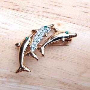 Vintage Dolphins Brooch Pin Rhinestones gold tone green eyes